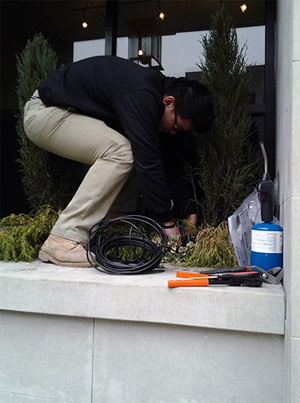 one of our specialists is installing a new drip irrigation system
